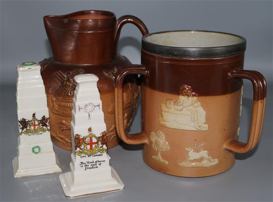 Two Lambeth stoneware vessels and two crested China models of monuments